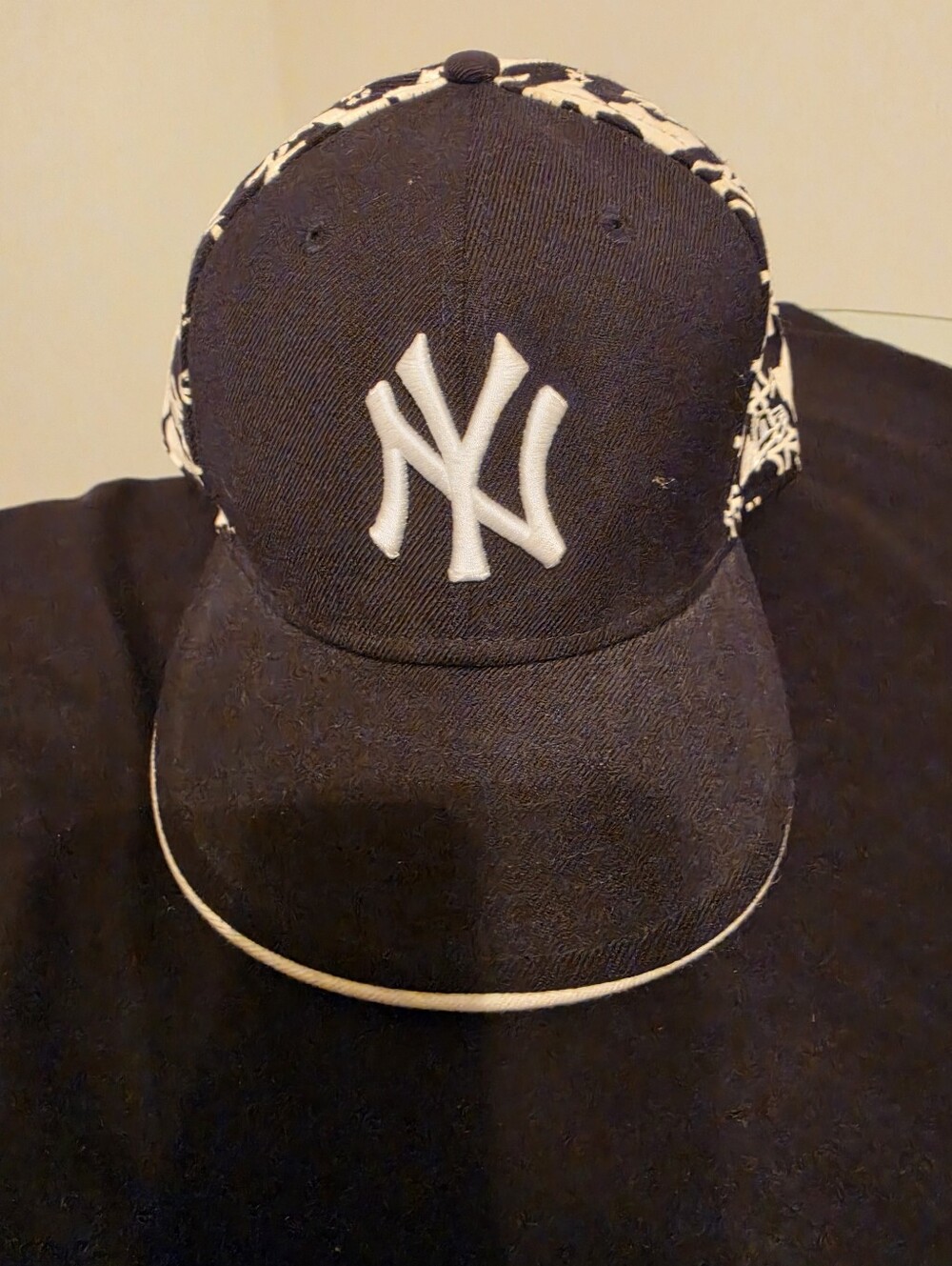 New Era Black Baseball Cap with White NY Logo